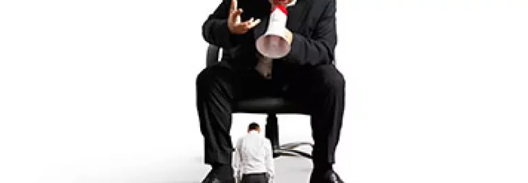 A large boss yelling through a megaphone at a smaller employee.