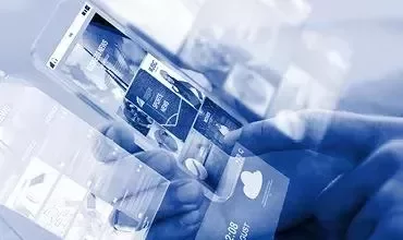 Hands interacting with transparent futuristic mobile devices.