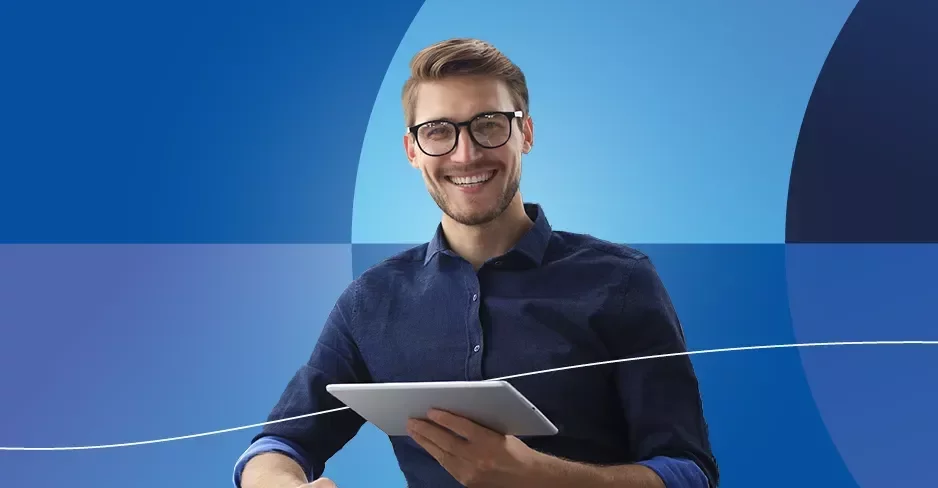 Promotiebanner van Salary Guides 2026 met een glimlachende man op een blauwe achtergrond.
